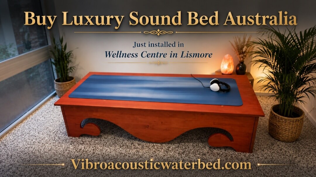 Luxury vibroacoustic sound bed installed in a wellness centre in Lismore Australia featuring handcrafted wooden vibrating waterbed design with headphones for deep relaxation and sound therapy.